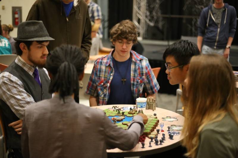 Students playing table games inside Union