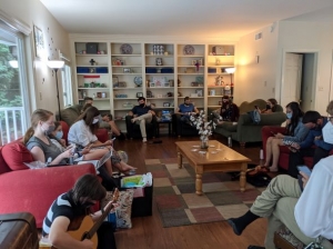 Hh main floor living room full of students