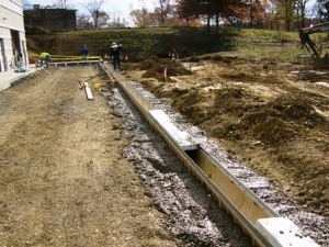 Concrete work off south wall