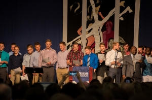Members of the men's alumni chorus honor the tradition of singing Messiah's alma mater