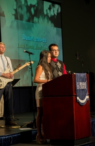 Members of the senior class deliver a charge to their peers at Baccalaureate