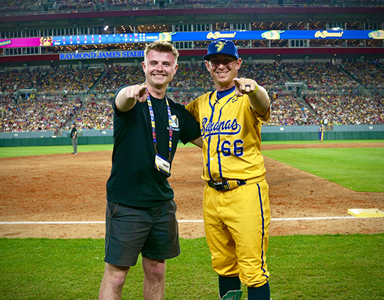 Caleb Kuiken and Bananas baseball player pointing at the camera together. 