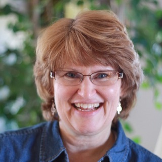 Woman smiles at camera