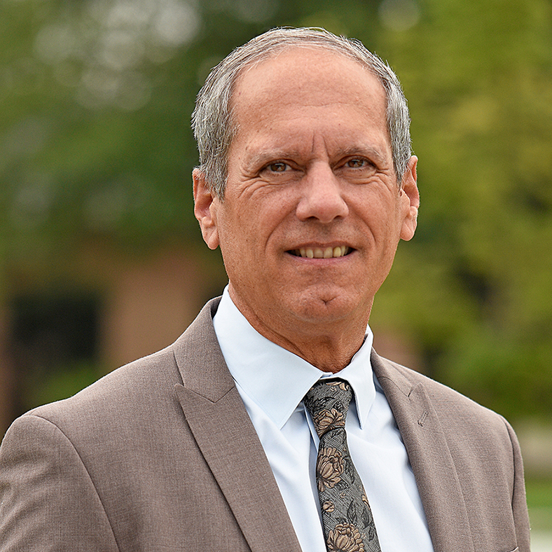 Headshot of interim president jon c. stuckey