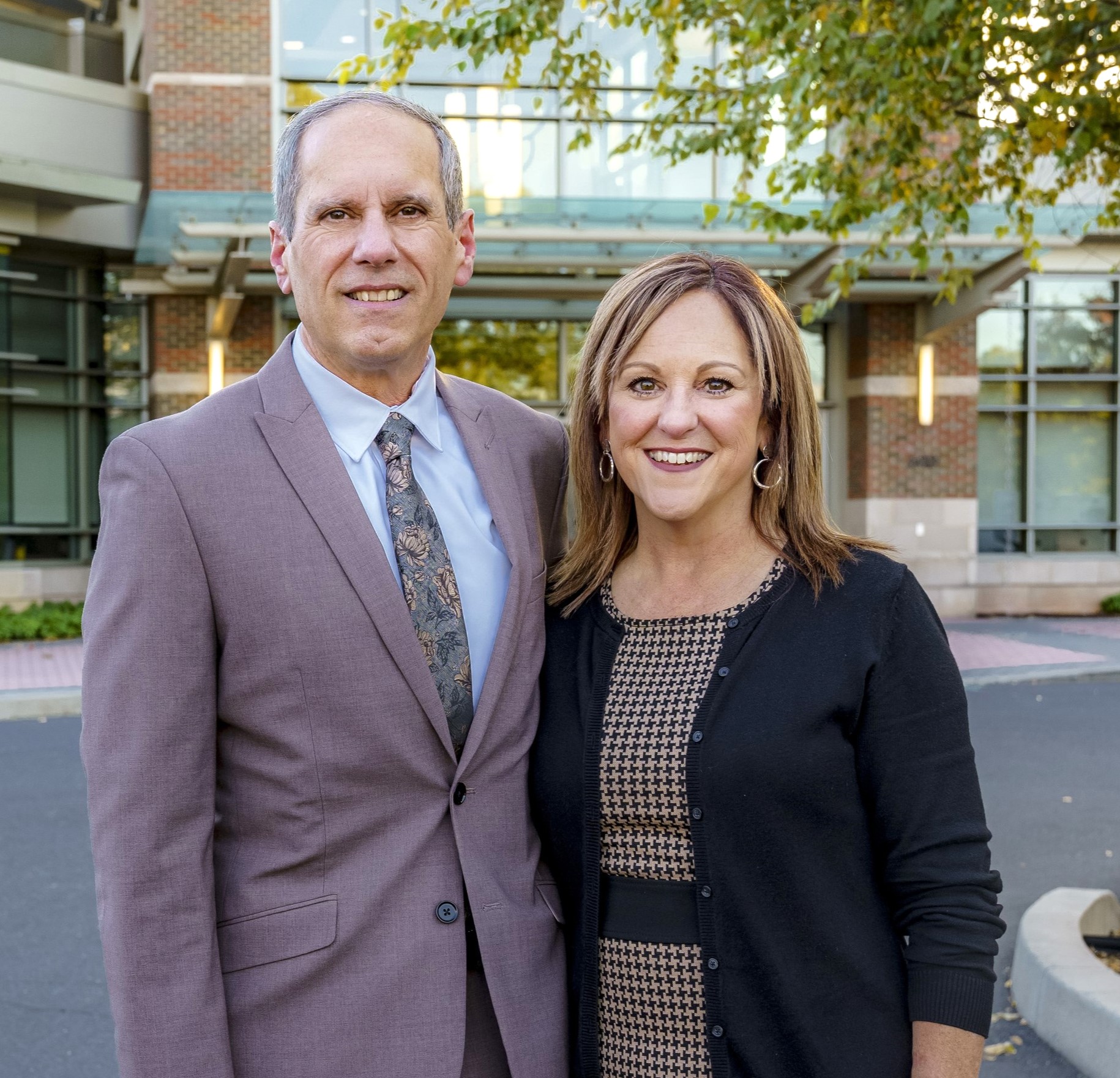 Jon Stuckey standing next to Shari Stuckey in High Center parking lot