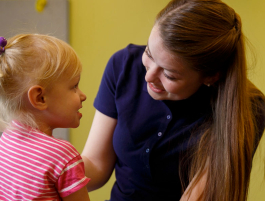 Female student with young child