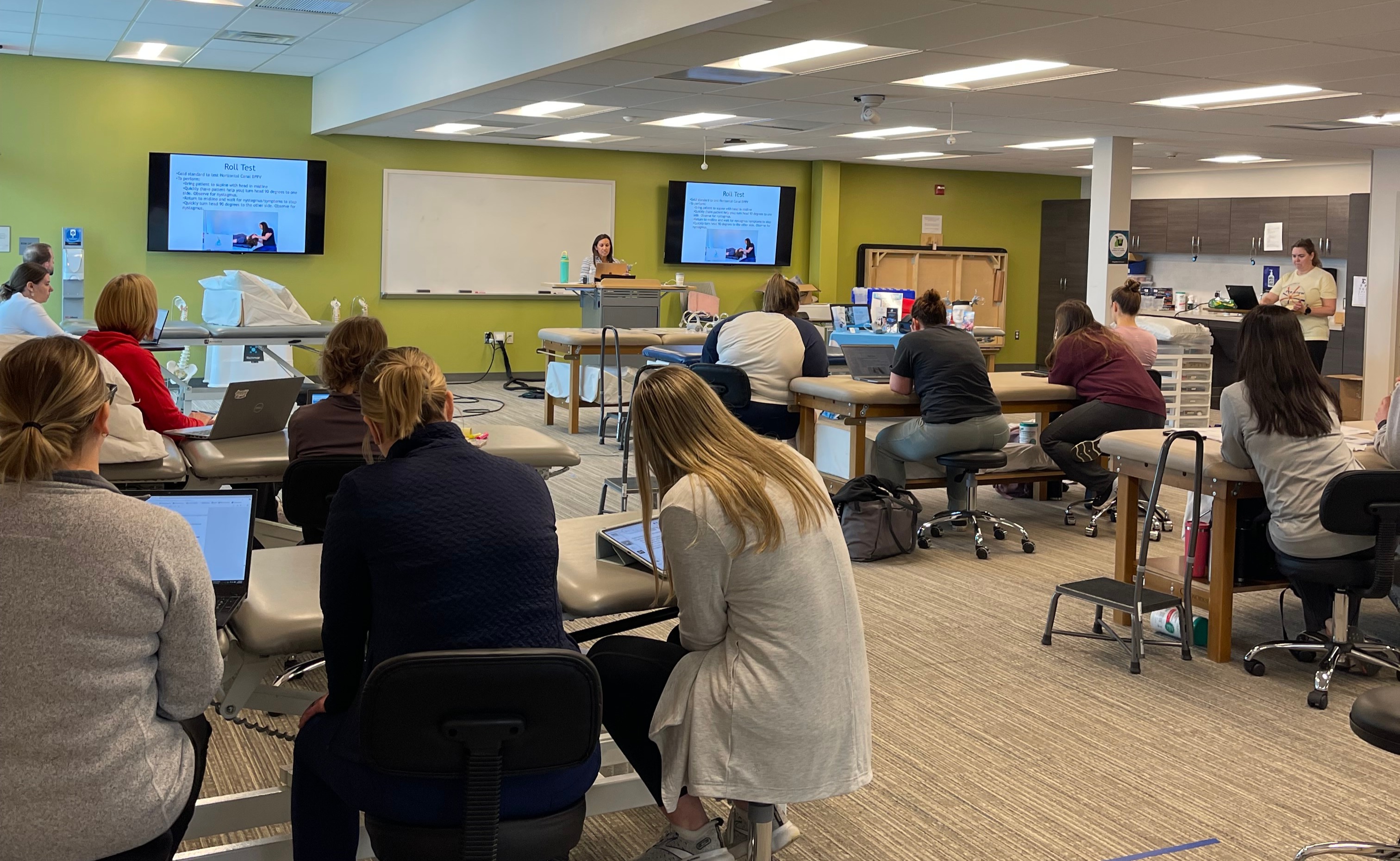 Participants in the vestibular rehab course listening to instructor Sara MacDowell's lecture.