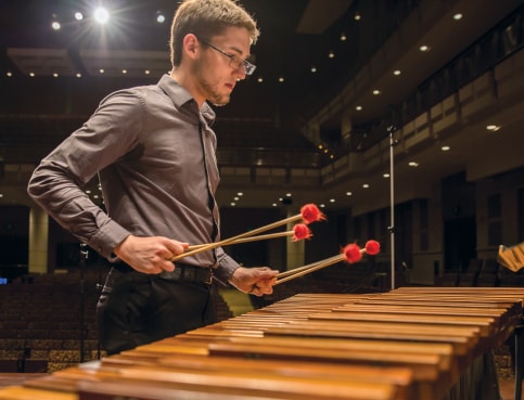 student playing music image