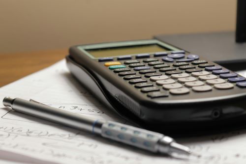 A calculator on a desk