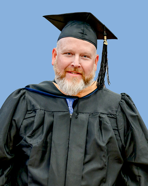 Photo of Norm Dyck at Graduate commencement