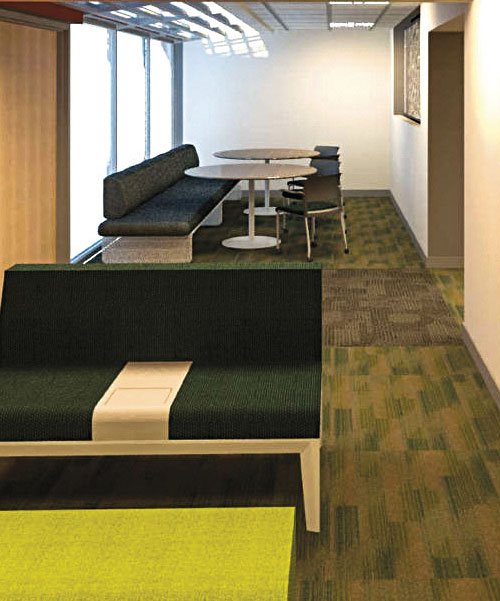 Modern lounge area with a green and gray seating arrangement and a round dining table.