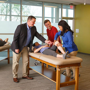 Students doing physical therapy