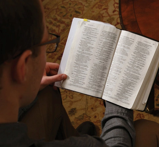 Two students reading the Bible