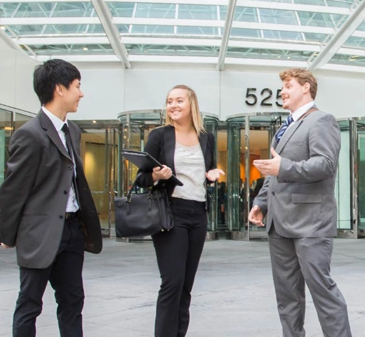 Three students in suits