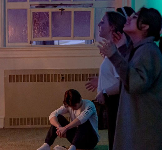 Students worshipping in church