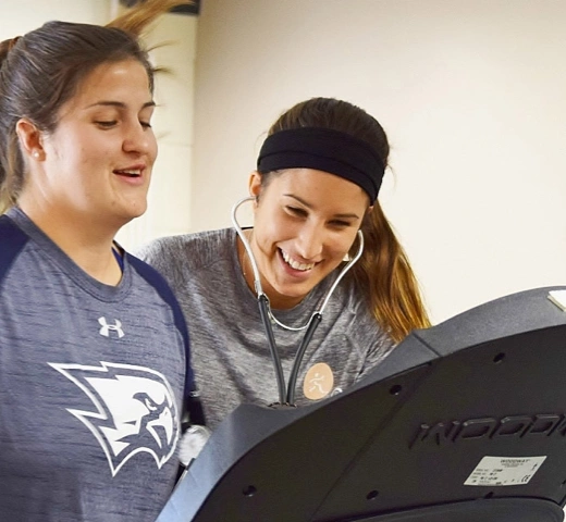 students exercising on a treadmill
