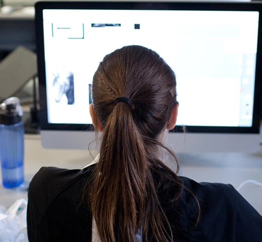 Student working on a iMac