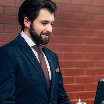 Hotel staff working on computer 