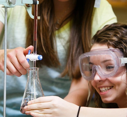 students doing an experiment in a lab.