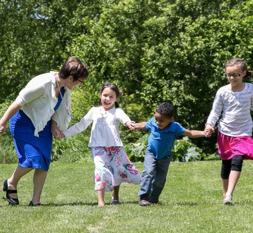 A family playing in a field 