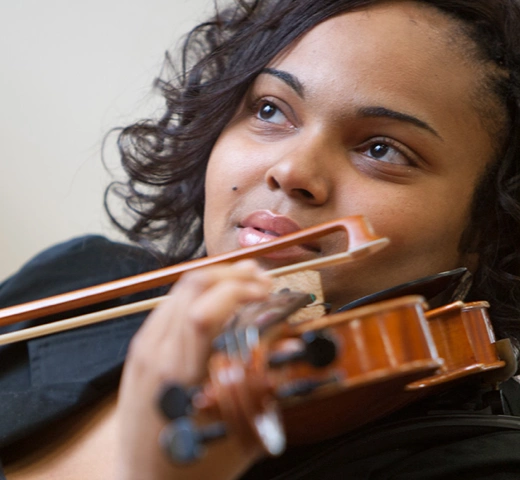 Student playing the violin